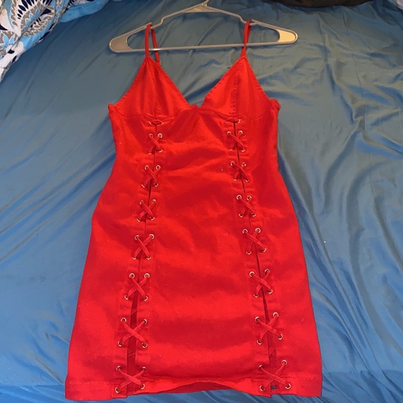 Red Strapless Skinny Dress with Cross Hatches Along The Sides - Picture 5 of 7